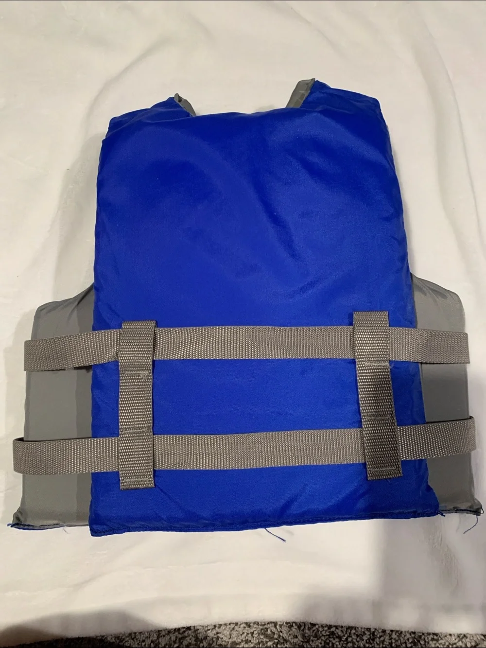 Youth Swim Life Jacket in Royal Blue with Adjustable Gray Straps